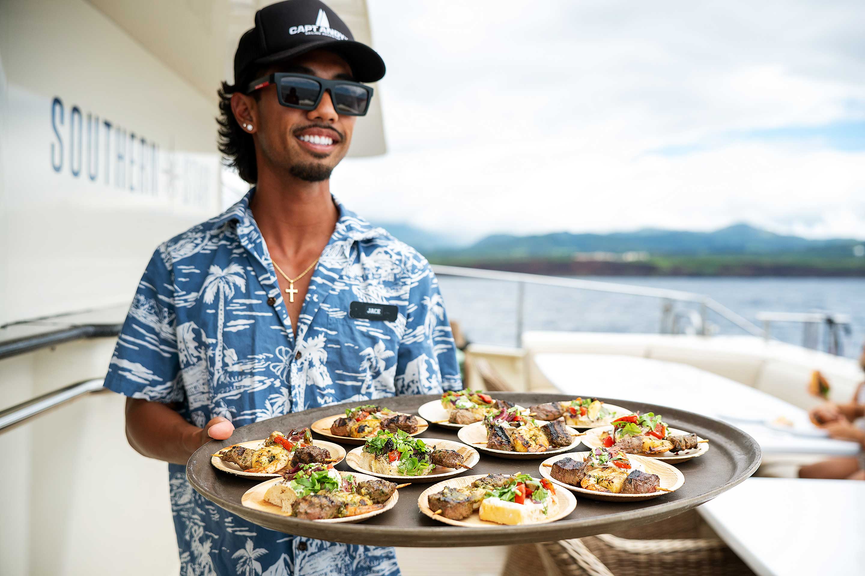 Dinner service on a Na Pali boat tour