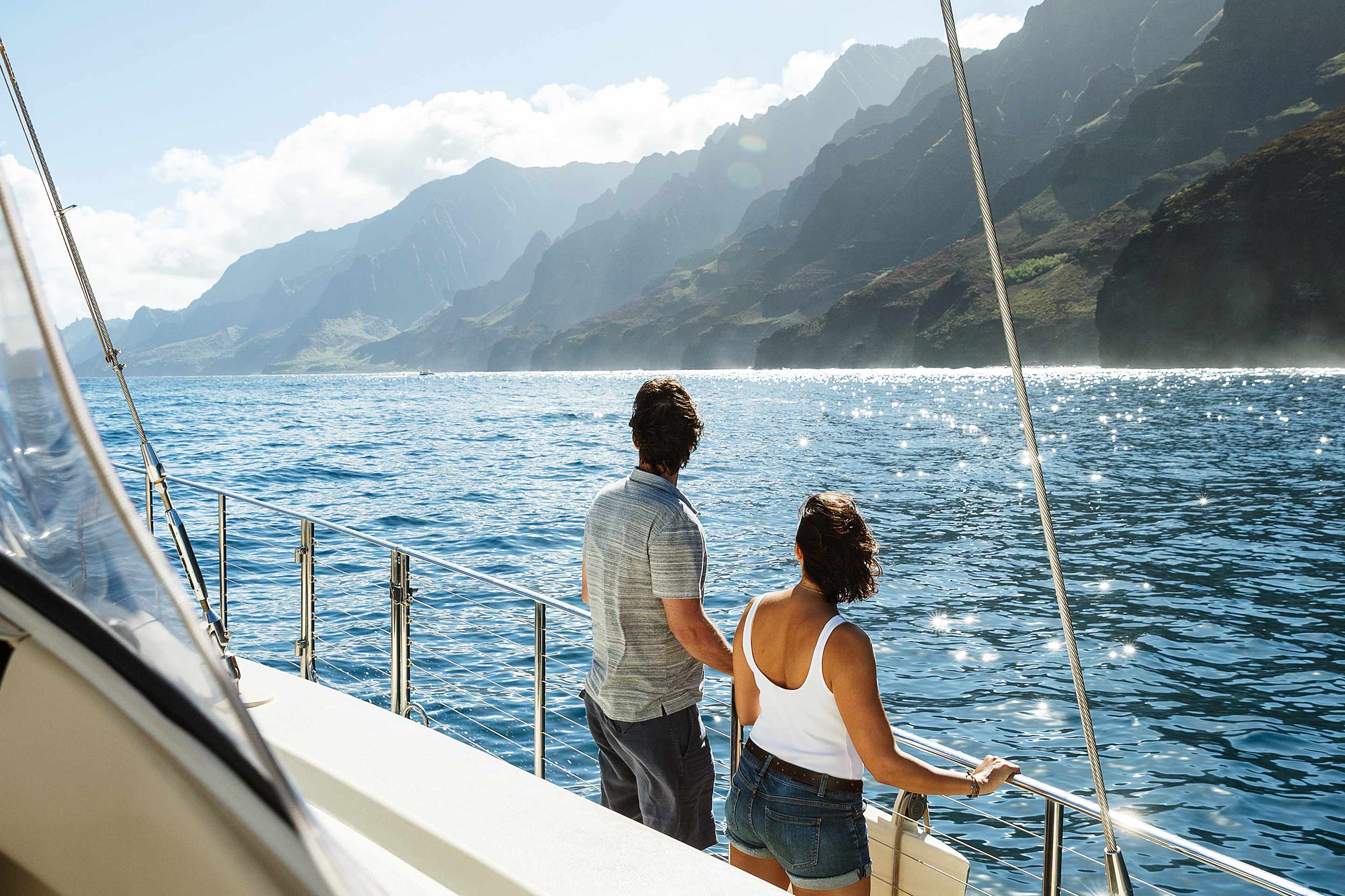 Couple Na Pali Coast sightseeing on a Star Class Yacht.